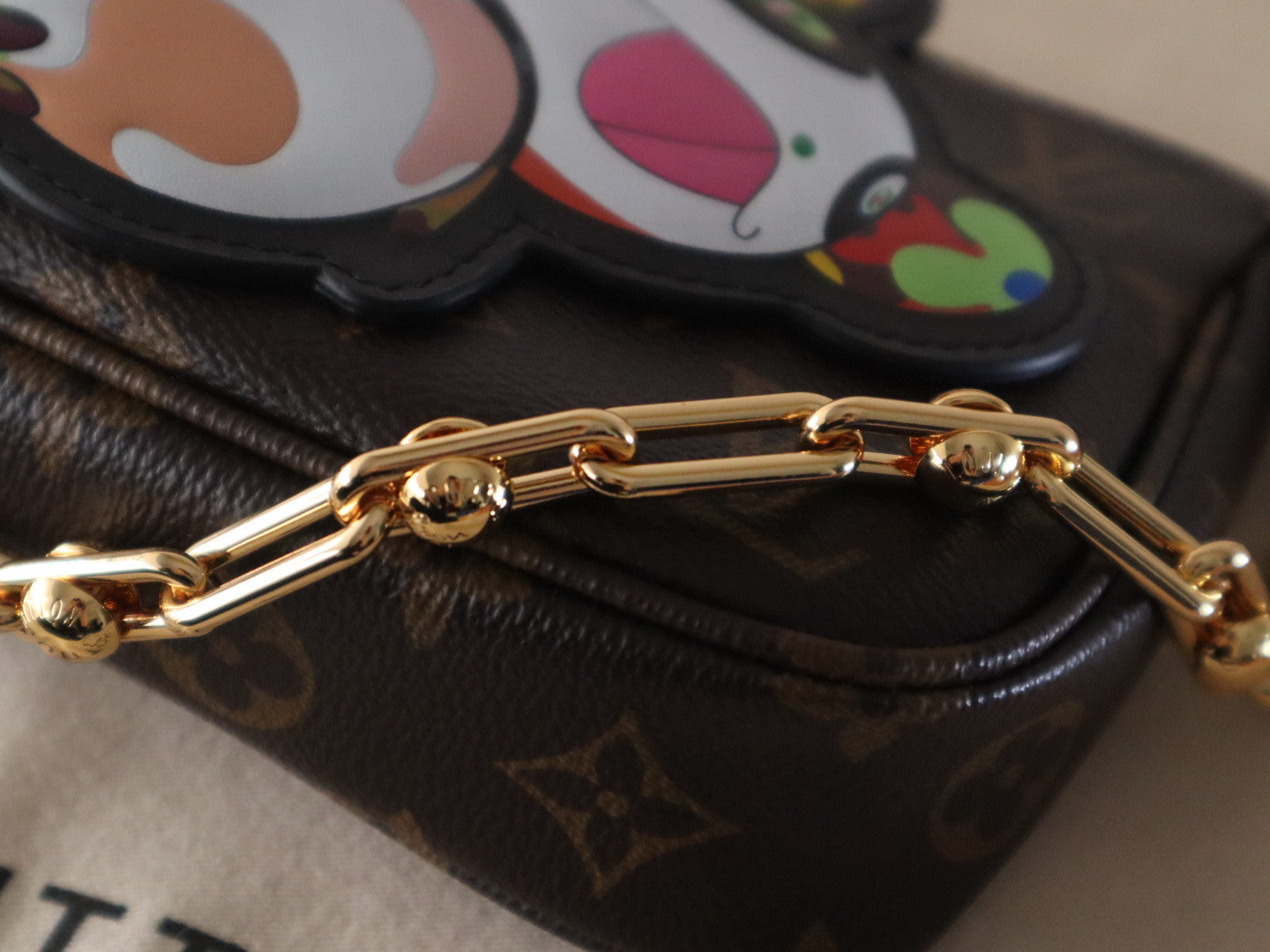 PANDA POCHETTE BAG 22 IN BROWN MONOGRAM COATED CANVAS