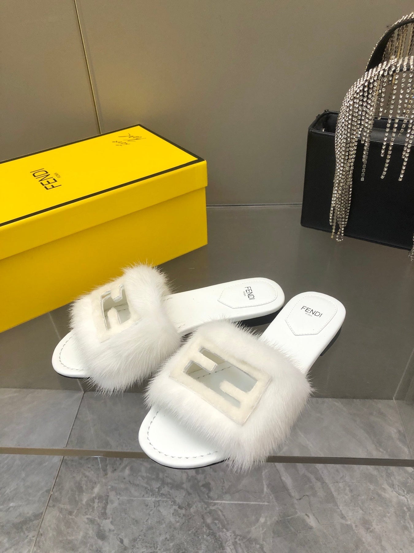 FENDI BAGUETTE MINK SLIDE SLIPPER IN WHITE FUR