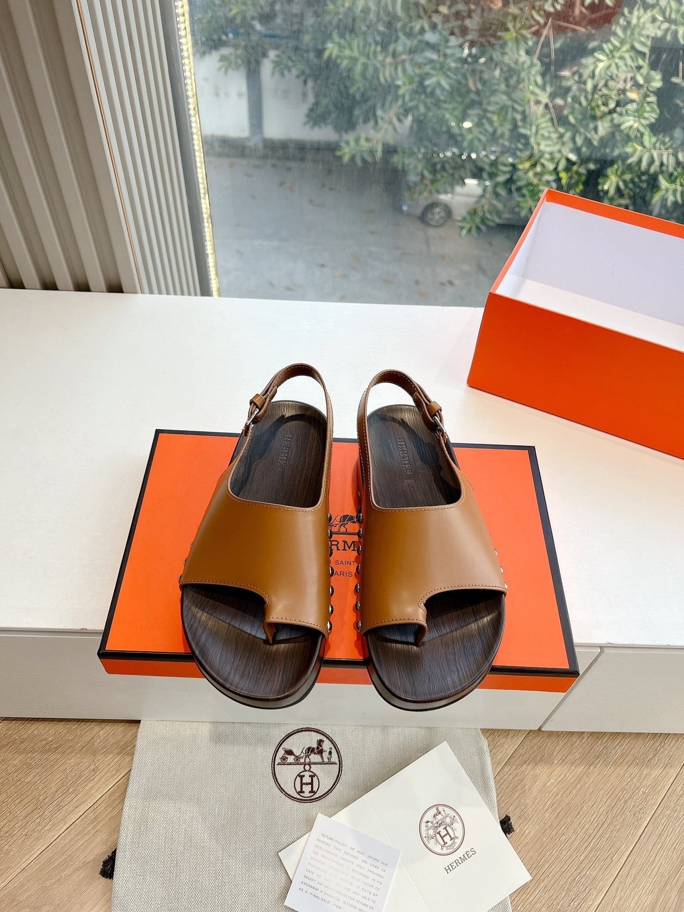 FLAT SANDAL IN BRONZE BROWN CALFSKIN