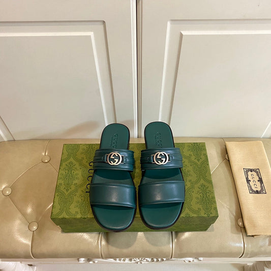 GG SANDAL WITH ROUND INTERLOCKING G IN DARK GREEN CALFSKIN