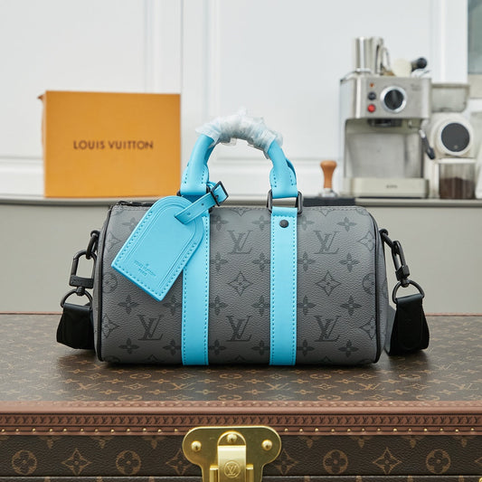 KEEPALL BANDOULIÈRE 25 IN GUN METAL MONOGRAM ECLIPSE CANVAS MIX TURQUOISE CALFSKIN