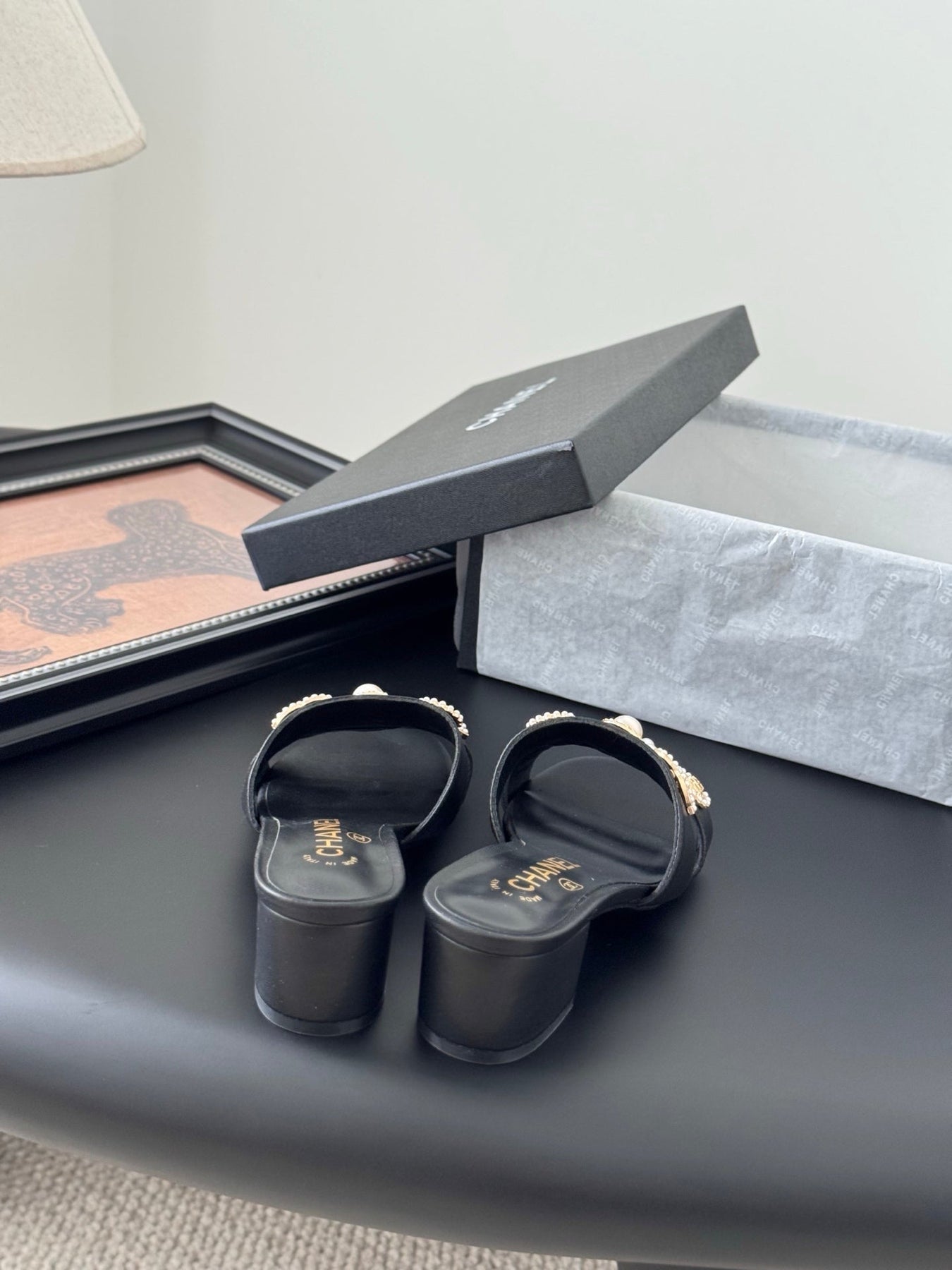 MULE SLIDE SANDALS IN BLACK LAMBSKIN WITH LOGO STICKER DETAIL