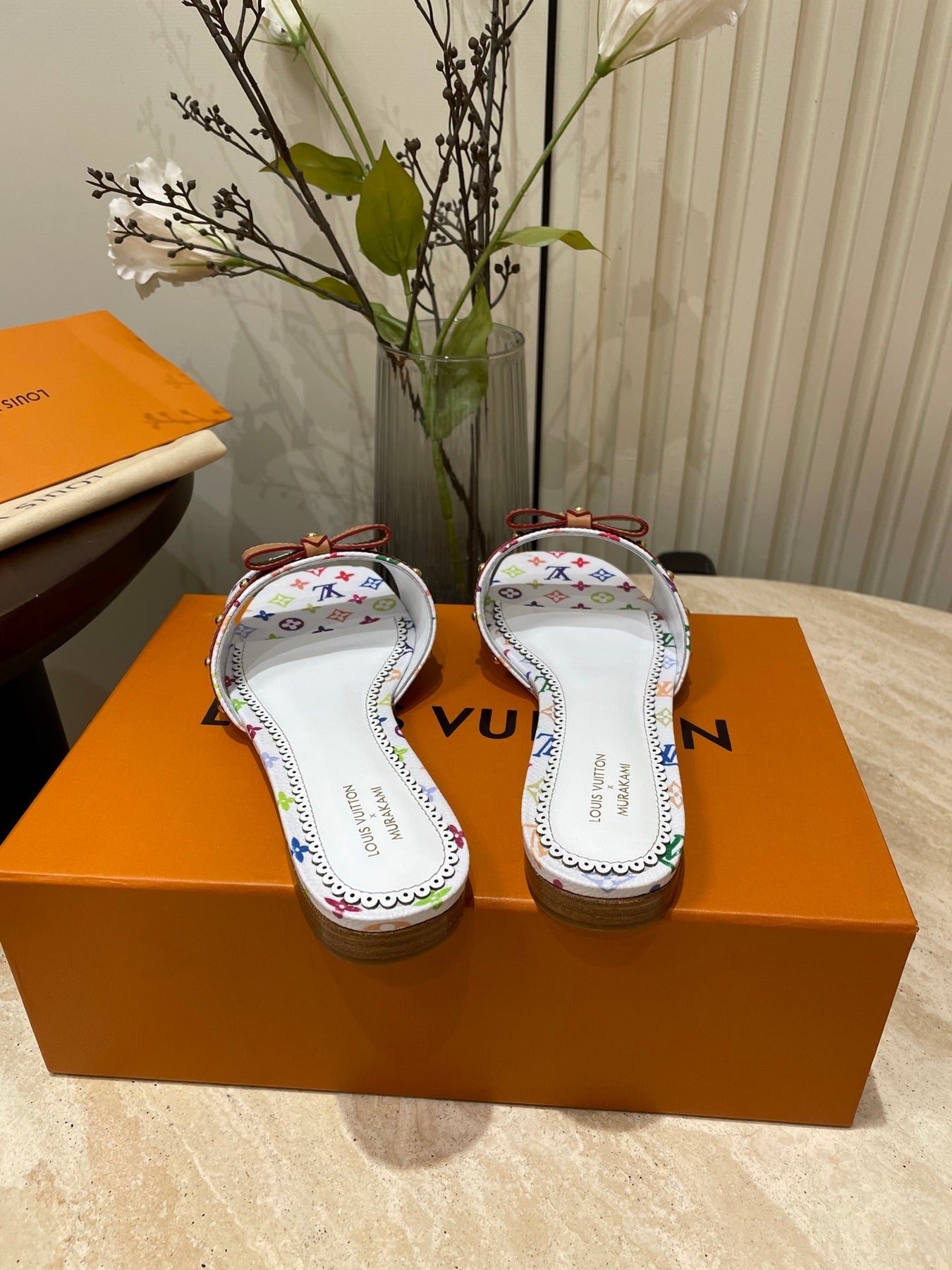 FLAT MULES IN WHITE MONOGRAM LAMBSKIN