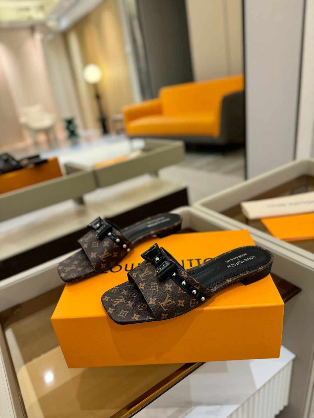 LV X TM 6AM FLAT MULE IN CHOCOLATE BROWN MONOGRAM CALFSKIN