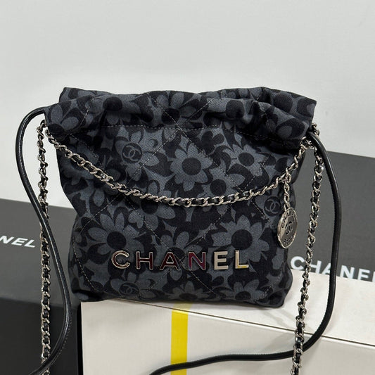 DRAWSTRING FLORAL PRINT SHOULDER BAG 20 IN BLACK MIX GREY DENIM