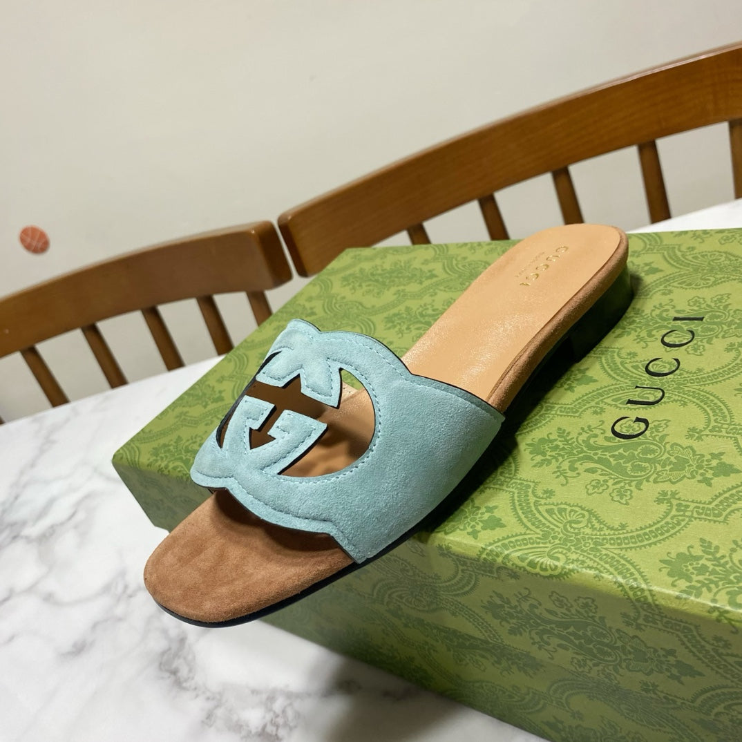 INTERLOCKING G SLIDE SANDAL IN MORNING BLUE SUEDE AND BROWN SHEEPSKIN LINING