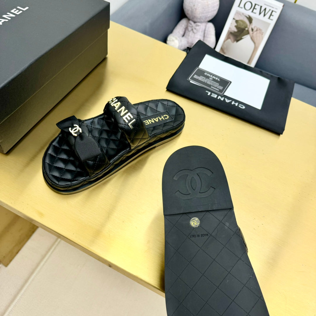 DAD SANDALS WITH BOW IN BLACK LAMBSKIN MULE