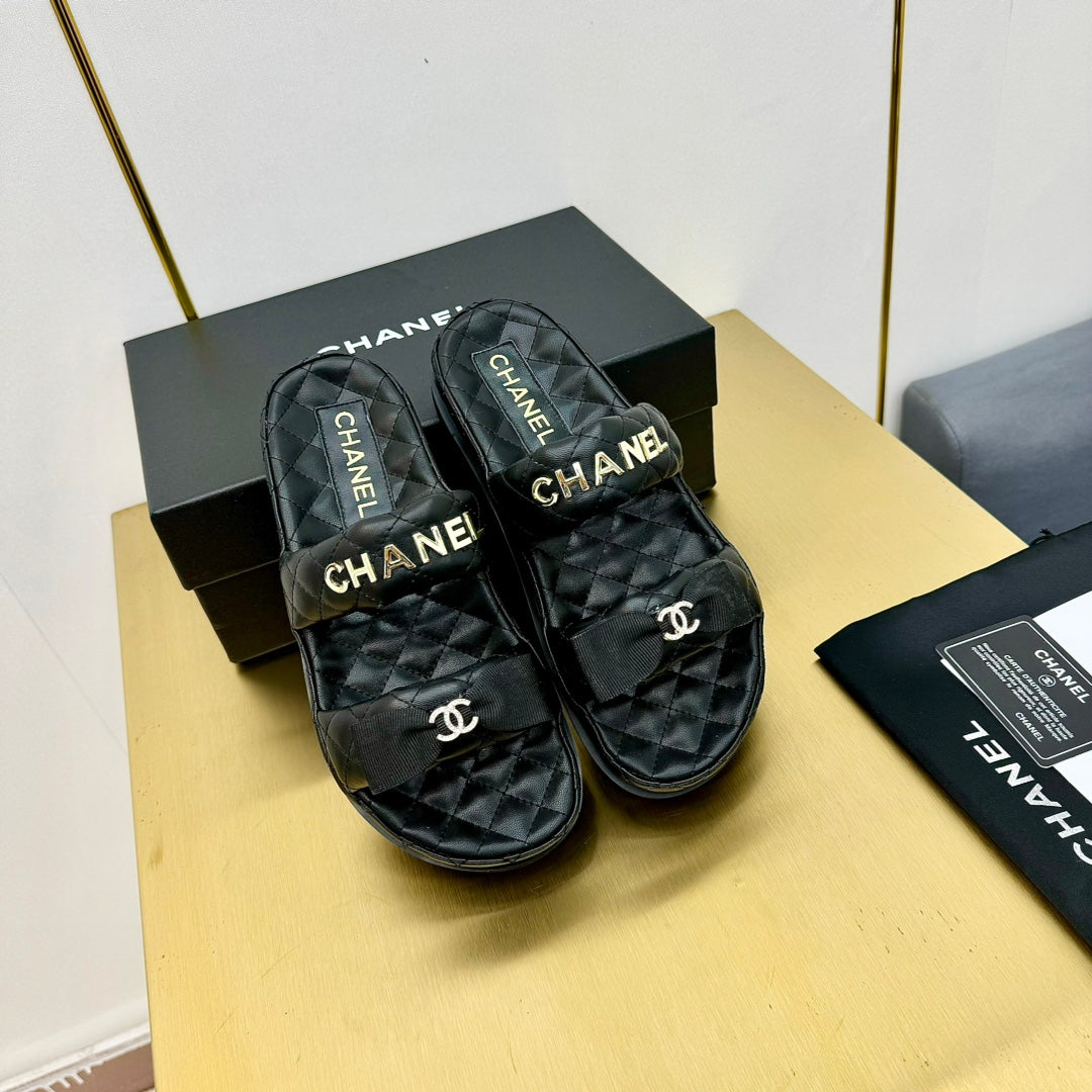 DAD SANDALS WITH BOW IN BLACK LAMBSKIN MULE