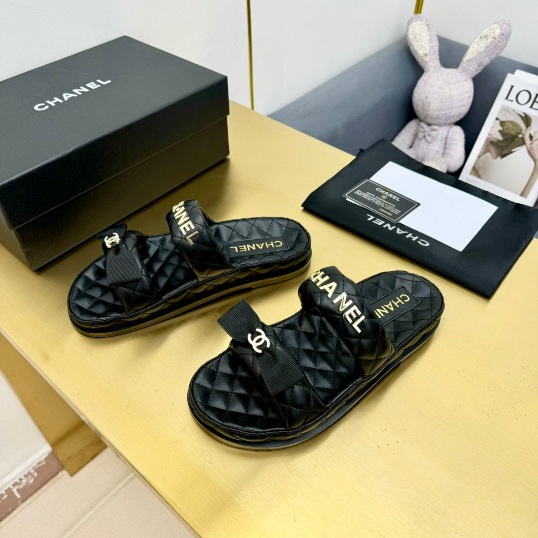 DAD SANDALS WITH BOW IN BLACK LAMBSKIN MULE