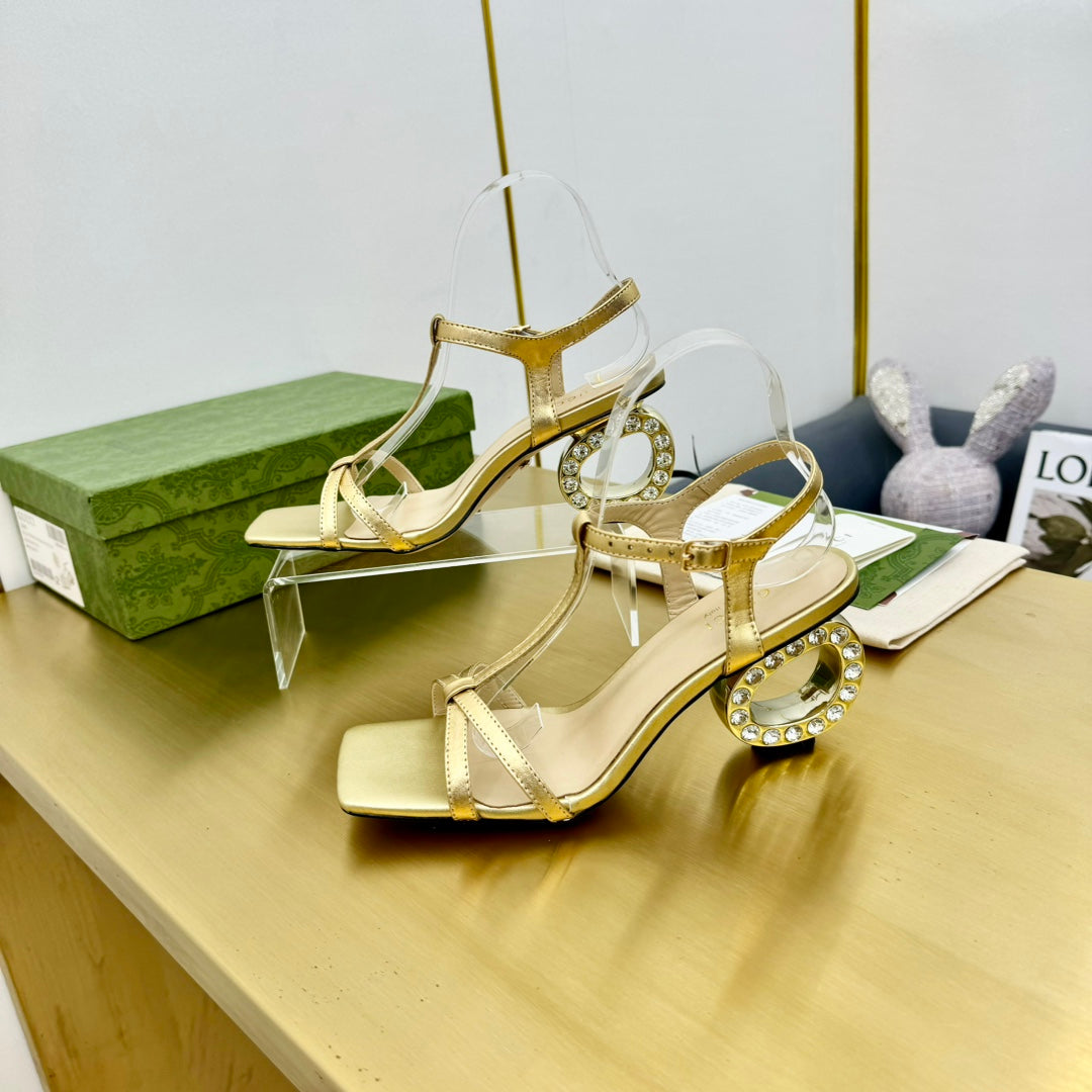 MEDIUM-HEEL SANDAL IN GOLD CALFSKIN GOLD HARDWARE WITH RHINSTONES