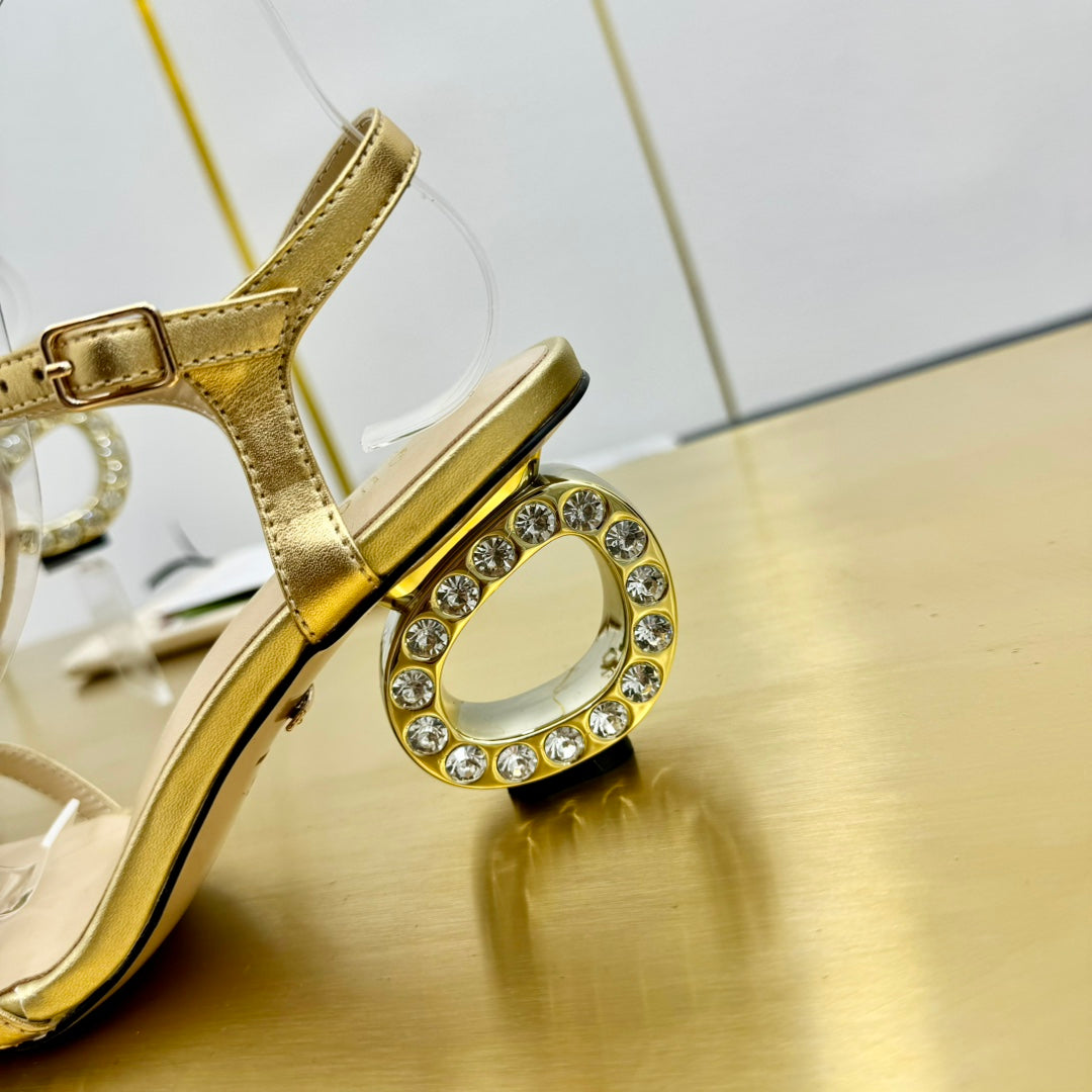 MEDIUM-HEEL SANDAL IN GOLD CALFSKIN GOLD HARDWARE WITH RHINSTONES