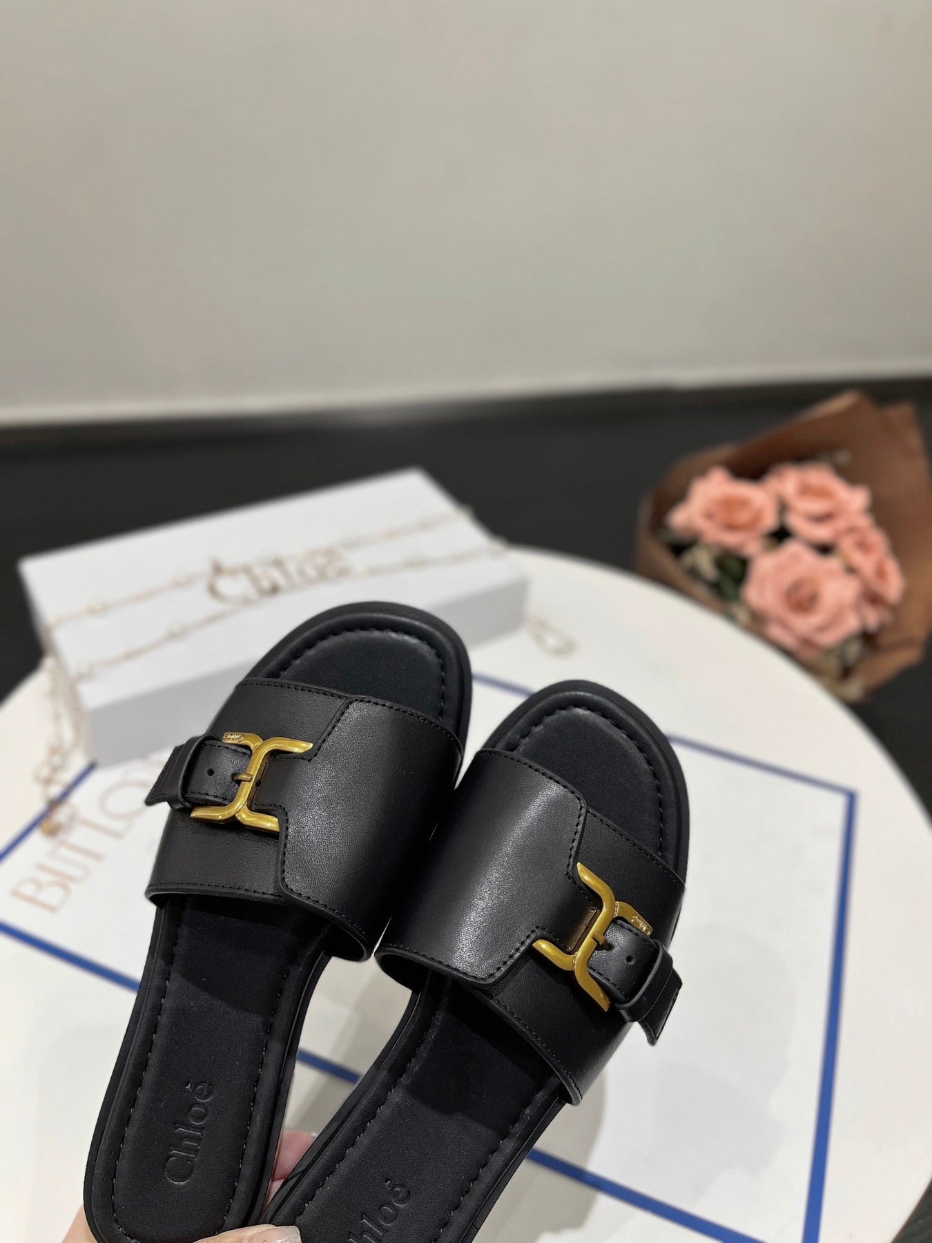 MARCIE SLIDE IN BLACK CALFSKIN WITH GOLD HARDWARE