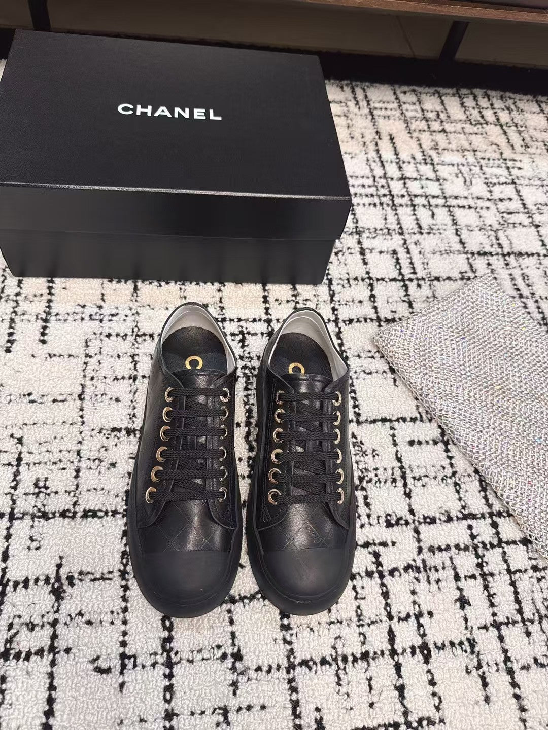 BISCUIT SNEAKERS IN BLACK CALFSKIN