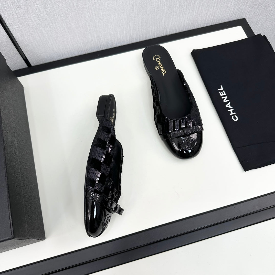 BOW MULE IN BLACK FABRIC AND CALFSKIN