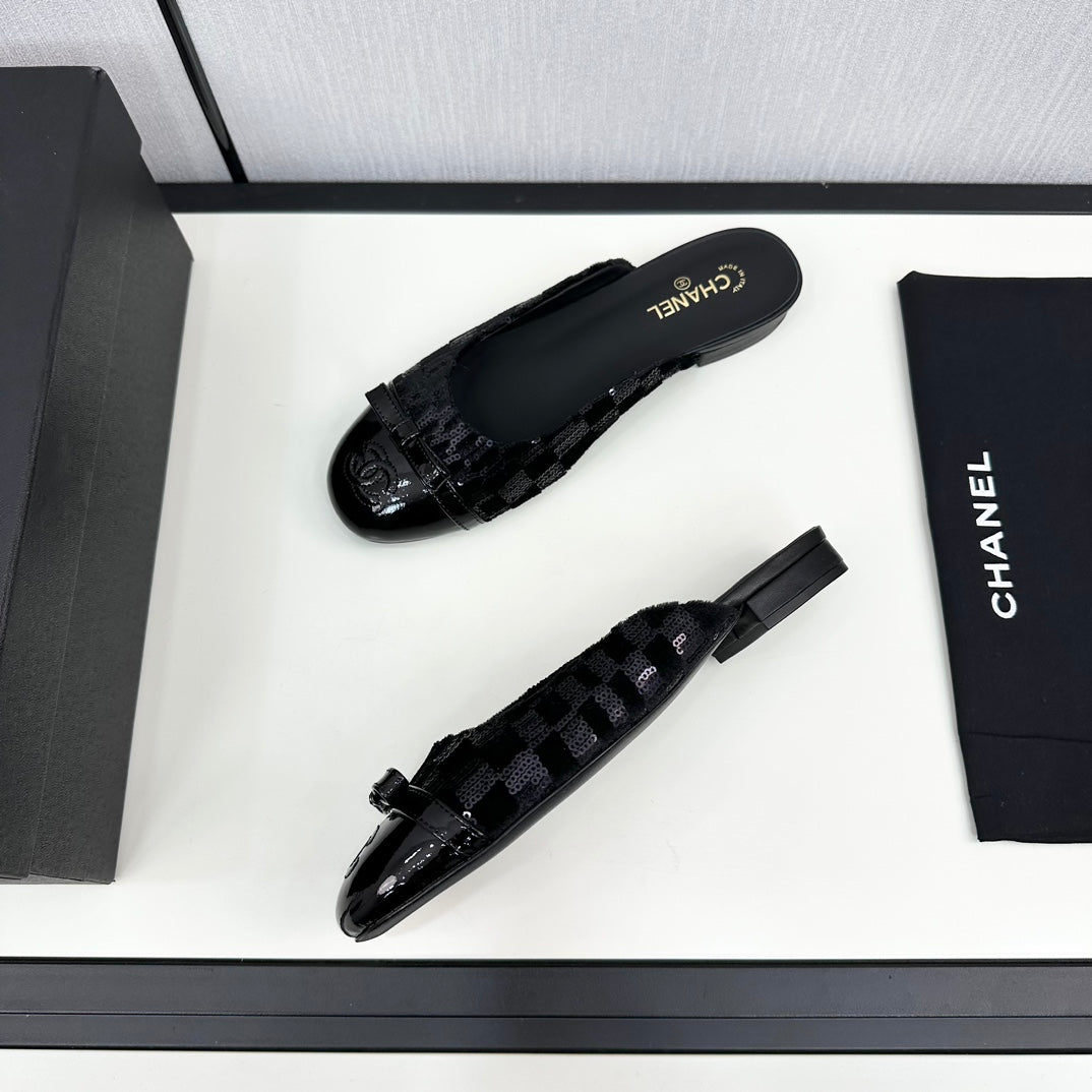 BOW MULE IN BLACK FABRIC AND CALFSKIN