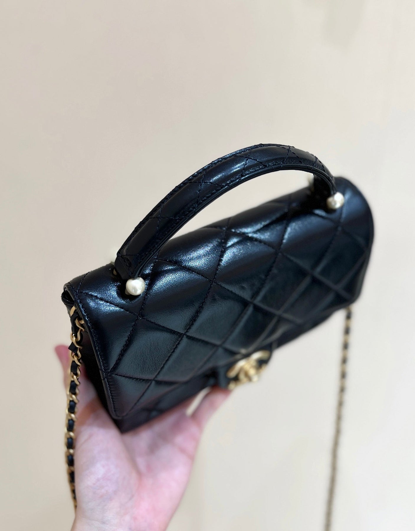 PEARL LIMITED EDITION FLAP BAG WITH HANDLE 20 IN BLACK LAMBSKIN